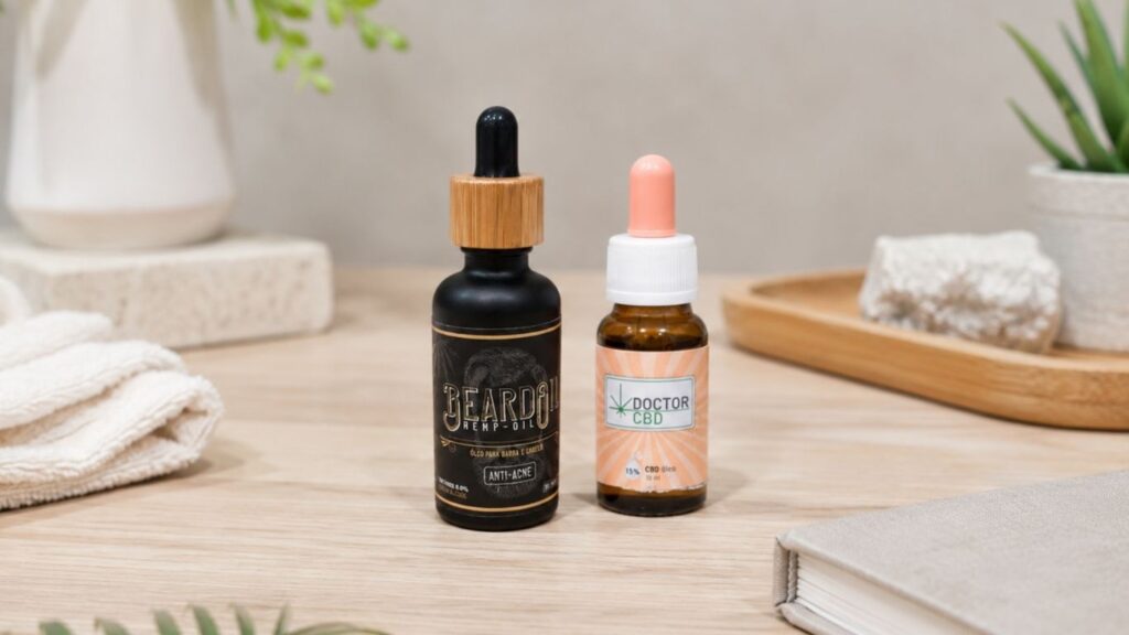 Dois frascos de cuidado pessoal sobre uma mesa de madeira, incluindo um óleo CBD para inflamação Doctor CBD e outro produto cosmético, com toalha, plantas e livro ao lado.
